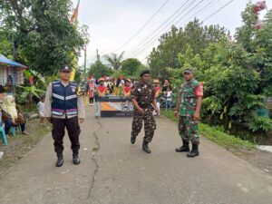 Karnaval Isra Mi’raj dan Haul Mbah Samsul Hadi Berlangsung Aman dengan Pengawasan Bhabinkamtibmas