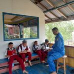 Ditpolairud Polda Kalteng Beri Layanan Pondok Baca Untuk Anak Anak Bantaran