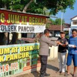 Kegiatan Rutin Hari Jum’at, Polsek Pancur Bagikan Nasi Kotak Ke