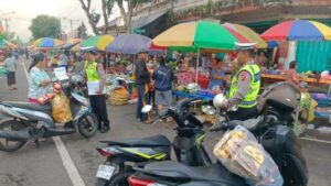 Operasi Patuh Agung 2024: Polres Jembrana Adakan Sosialisasi di Pasar Jembrana untuk Tertib Lalu Lintas