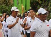 Wakapolda Kalteng Ajak Masyarakat Sukseskan Pilkada 2024 Dalam Jalan Sehat