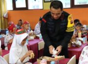 Brimob Bagikan 1.200 Paket Makanan Bergizi Untuk Siswa Sd, Wakapolda