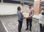 Kapolres Jembrana Bagikan Bantuan Sosial Dalam Program Minggu Kasih