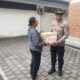 Kapolres Jembrana Bagikan Bantuan Sosial Dalam Program Minggu Kasih