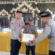 Kapolres Jembrana Bantu Warga Pulukan Lewat Program Minggu Kasih